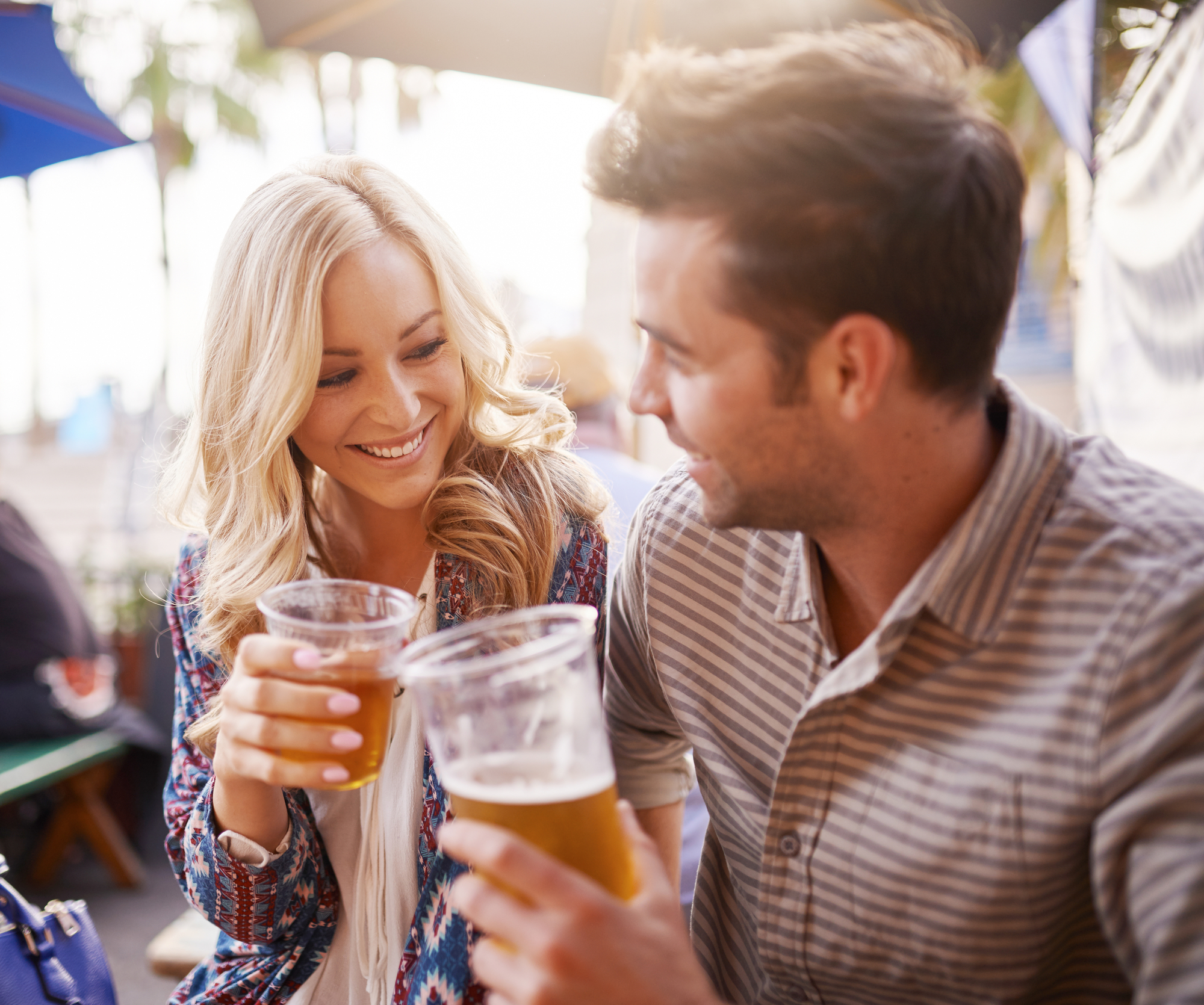 Man and Woman Drinking Beers